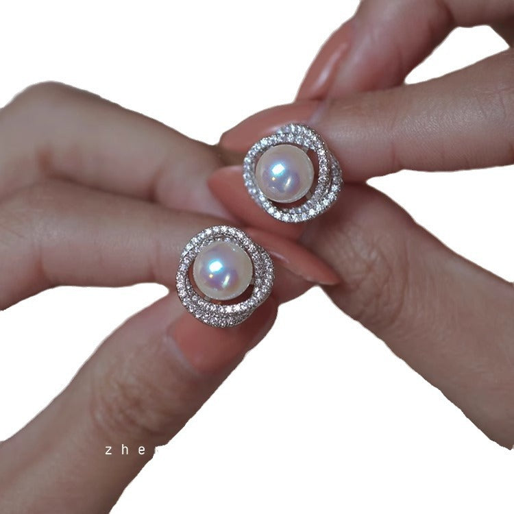 Elegant atmosphere of natural strong light freshwater 6A flat round pearl earrings temperament senior sense of light luxury 925 silver earrings