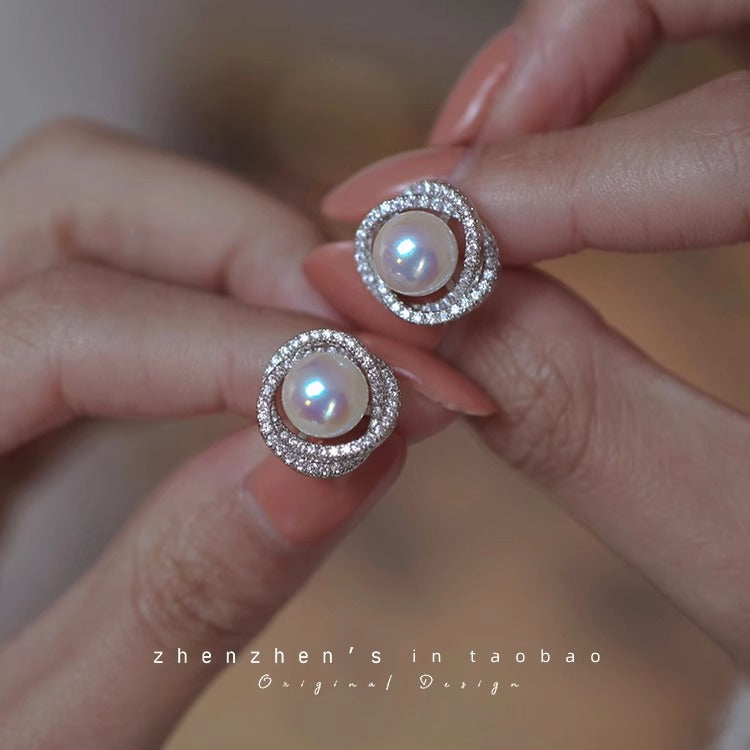 Elegant atmosphere of natural strong light freshwater 6A flat round pearl earrings temperament senior sense of light luxury 925 silver earrings